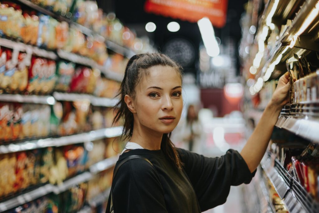 A girl shopping for groceries in a supermarket