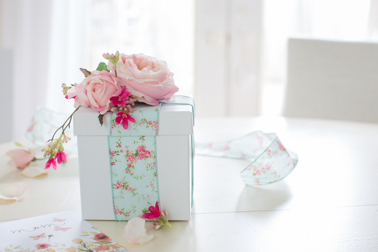 Present stand. Present Flowers. Paper Wrapped Gift Box Scene.